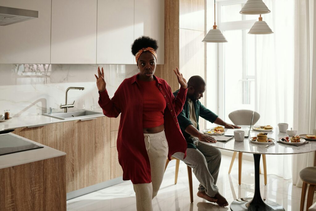 Black couple at breakfast having an argument